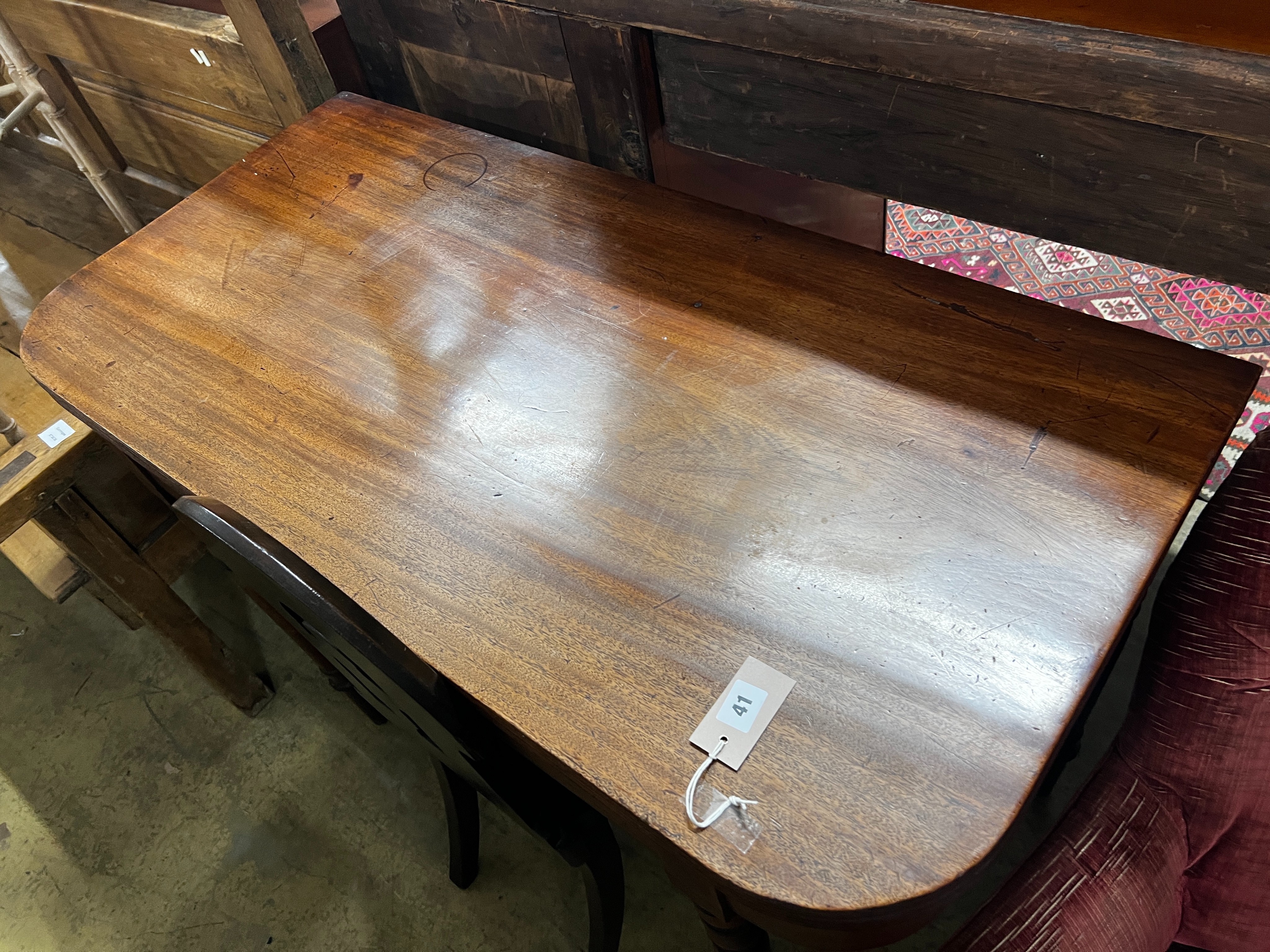 A Regency mahogany folding tea table, width 106cm, depth 52cm, height 77cm and a Victorian oak hall chair